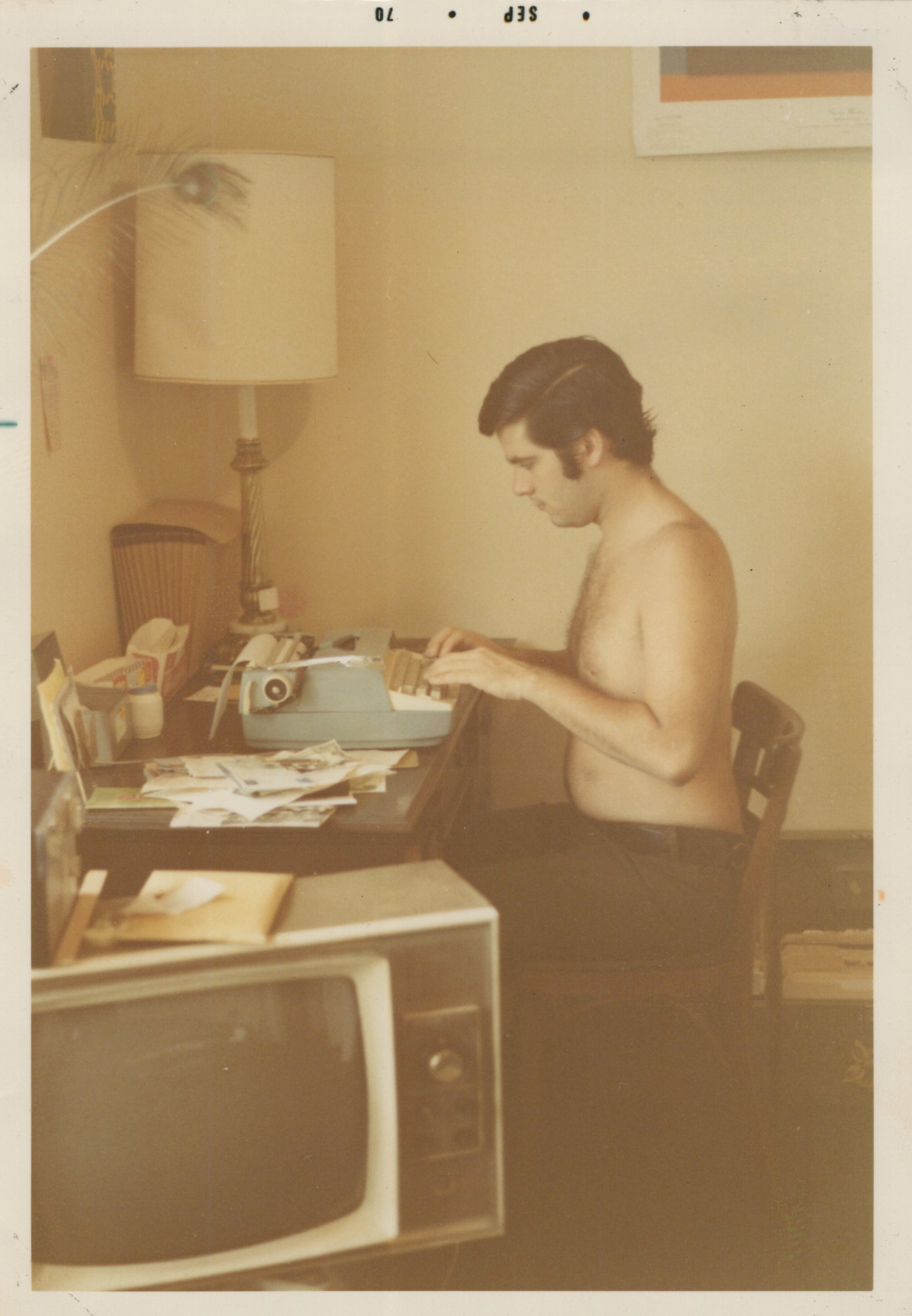 Simon Townsend at his typewriter, 1970
